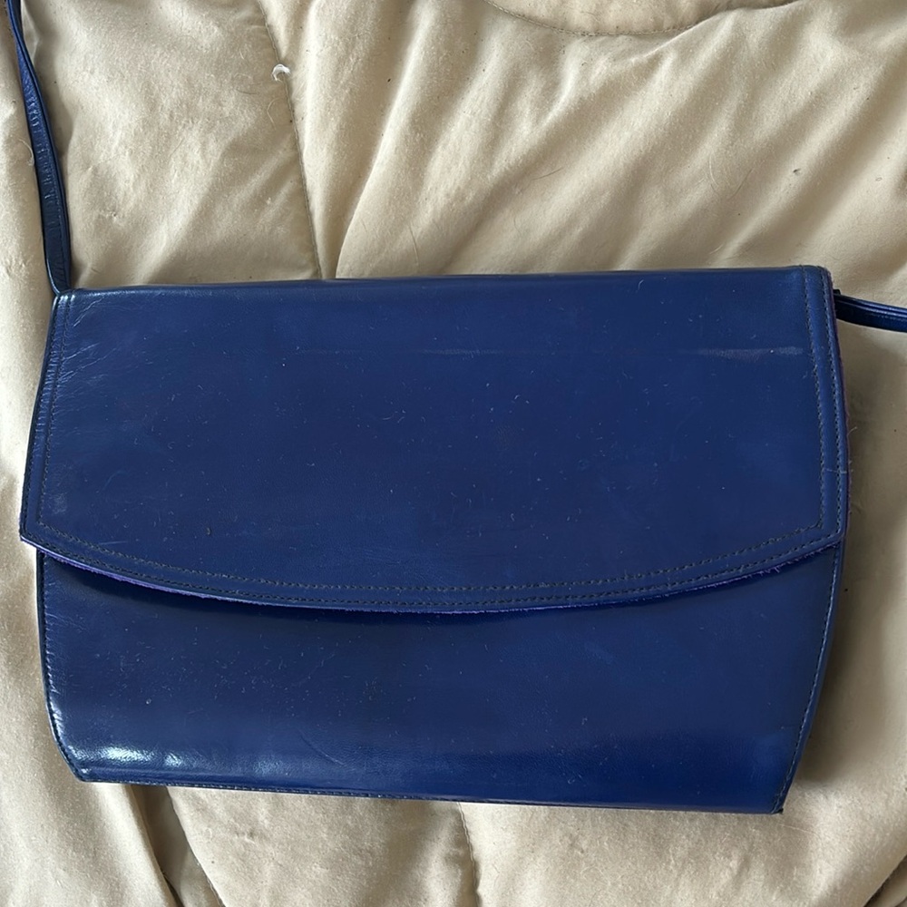 Gorgeous blue leather. Detachable strap. Crossbody or clutch.